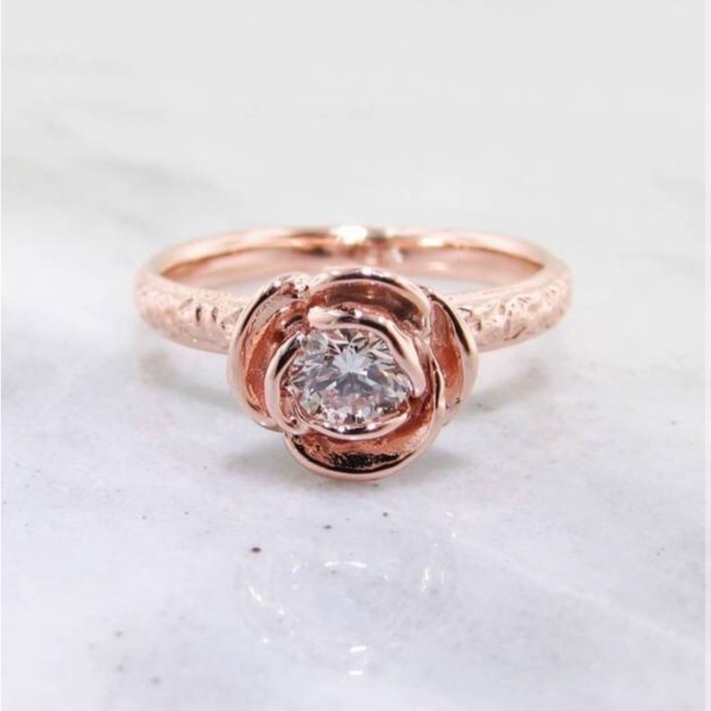 Custom designed diamond ring. 14k rose gold with 0.35ct with GIA certificate.